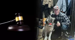 Cody Roberts with the wolf he killed